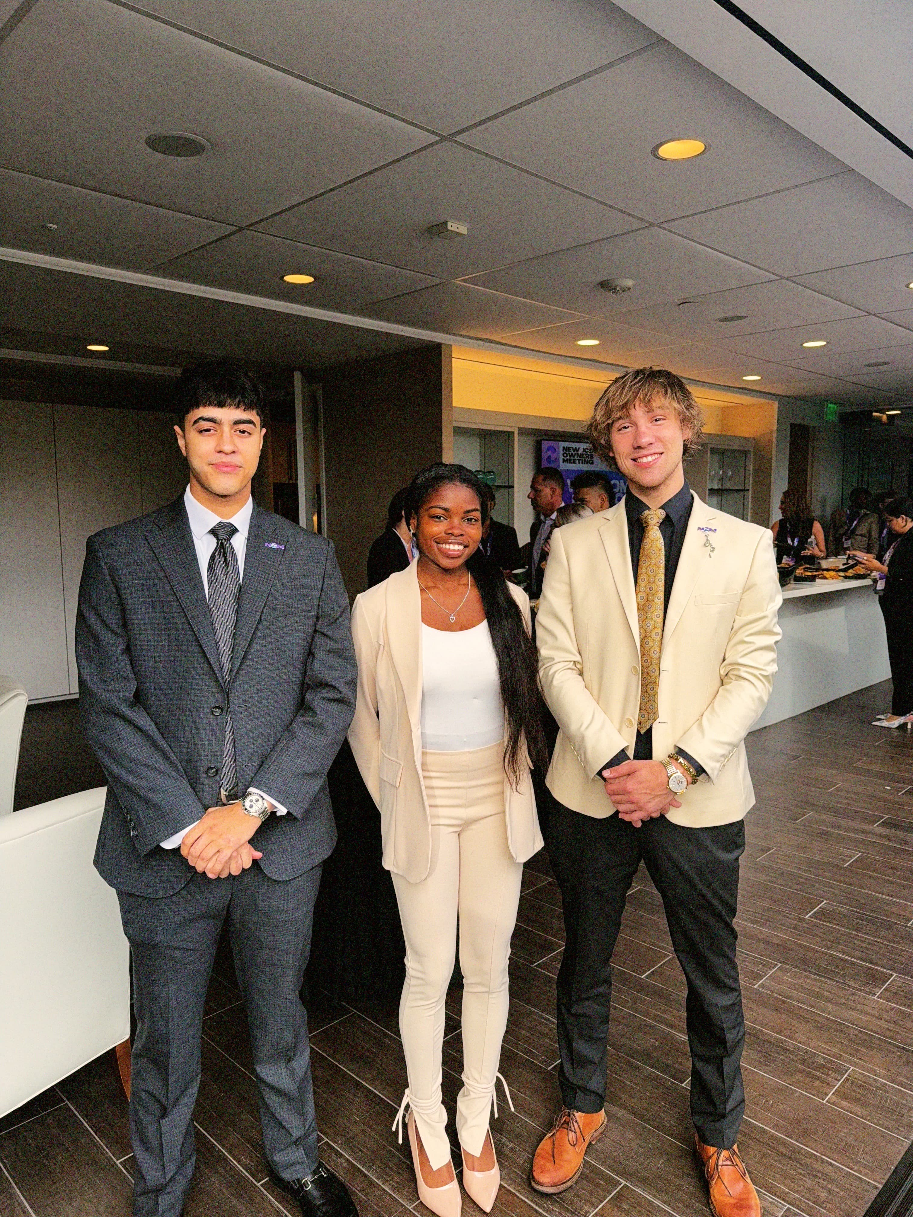 Visionary Insights team members at a professional leadership event